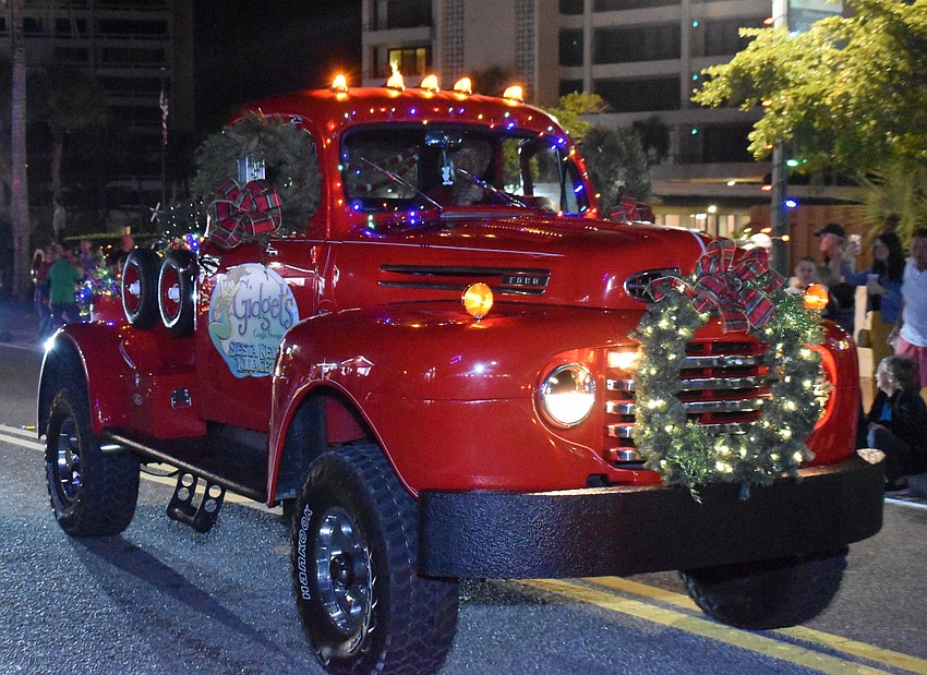 Gidget's Coastal Provisions uses a decked out truck as its float.