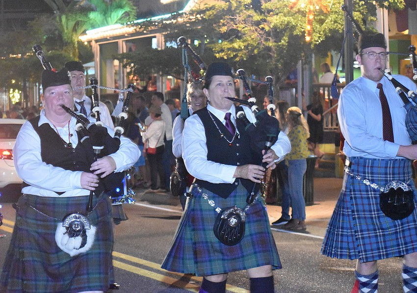 Though there were no 12 drummers drumming, the parade did have bagpipers piping.