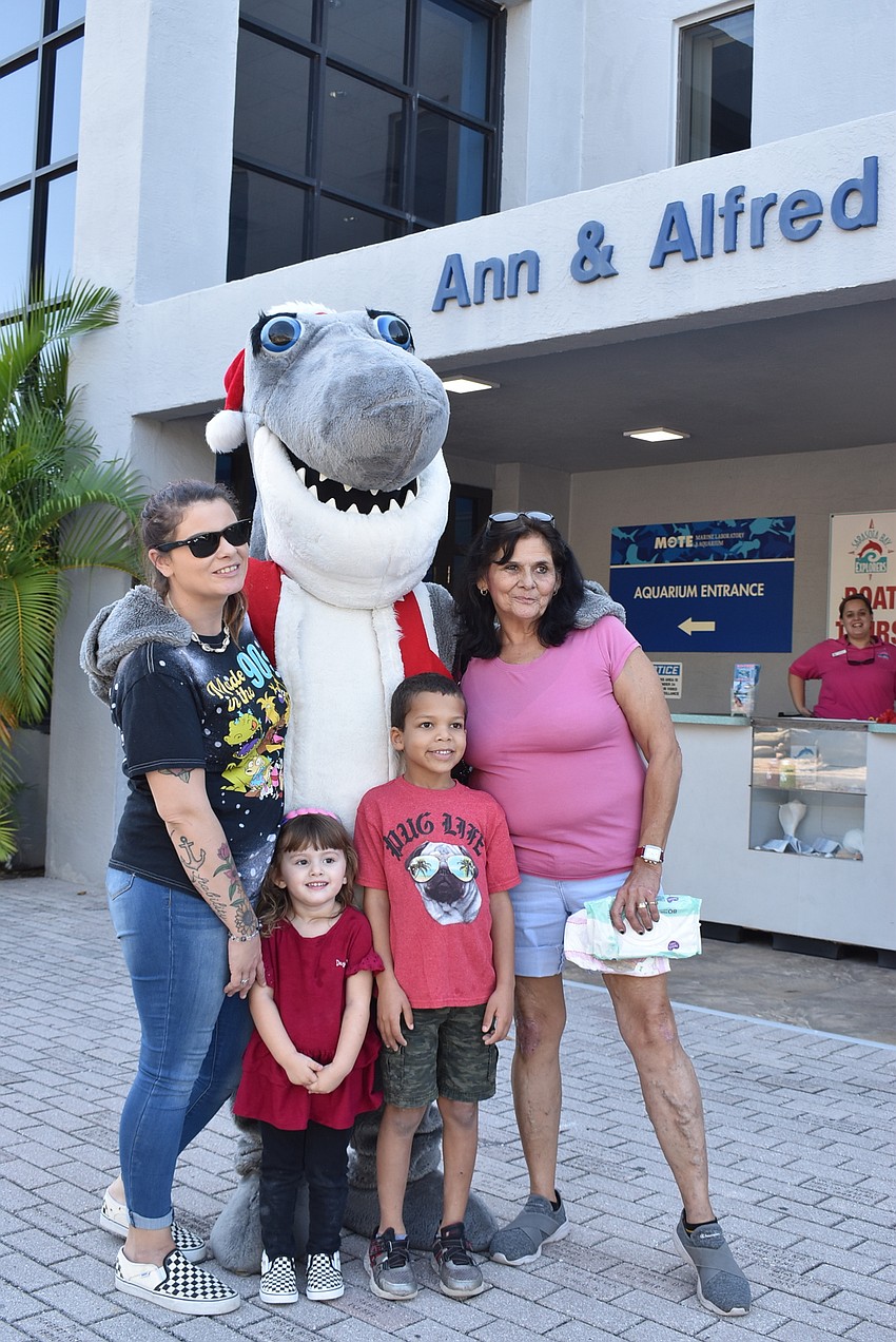 Susan, Freya, Carter and Nikki Sims with Santa Jaws.