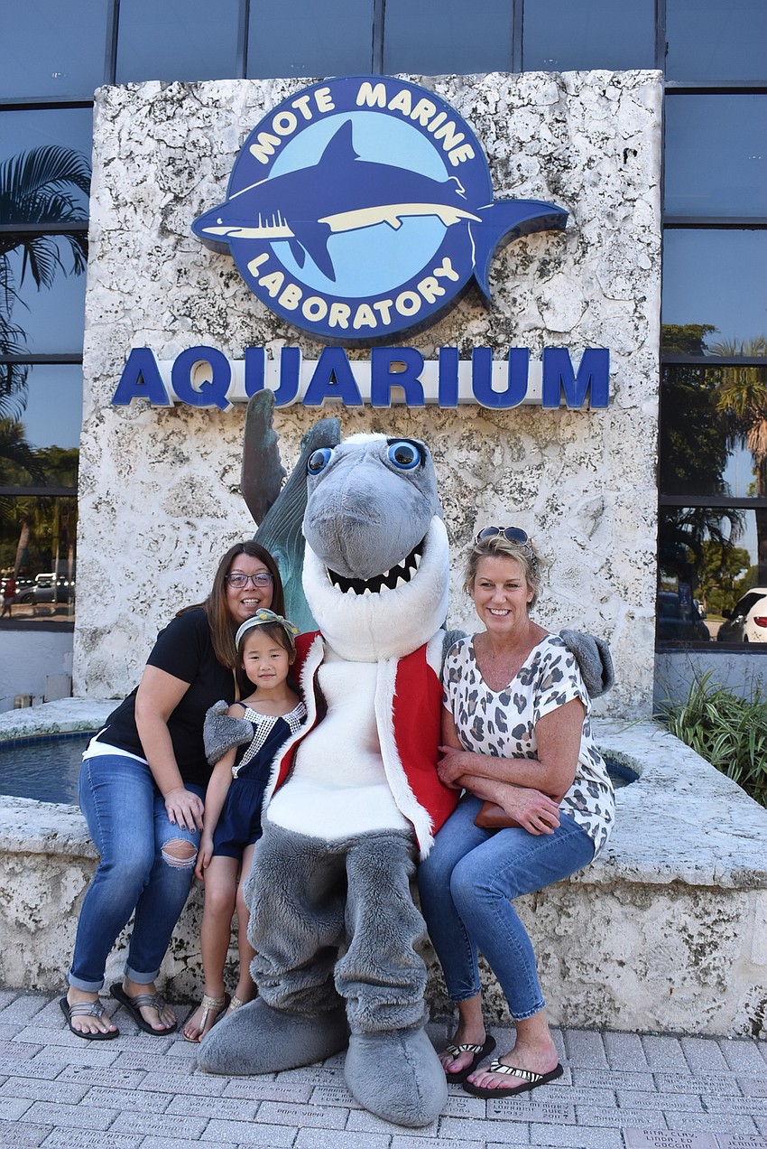 Charlotte and Brianne Bromagen and Darlene Engle with Gilly.