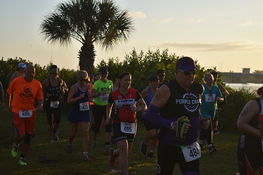 Runners take off for the first duathlon leg.