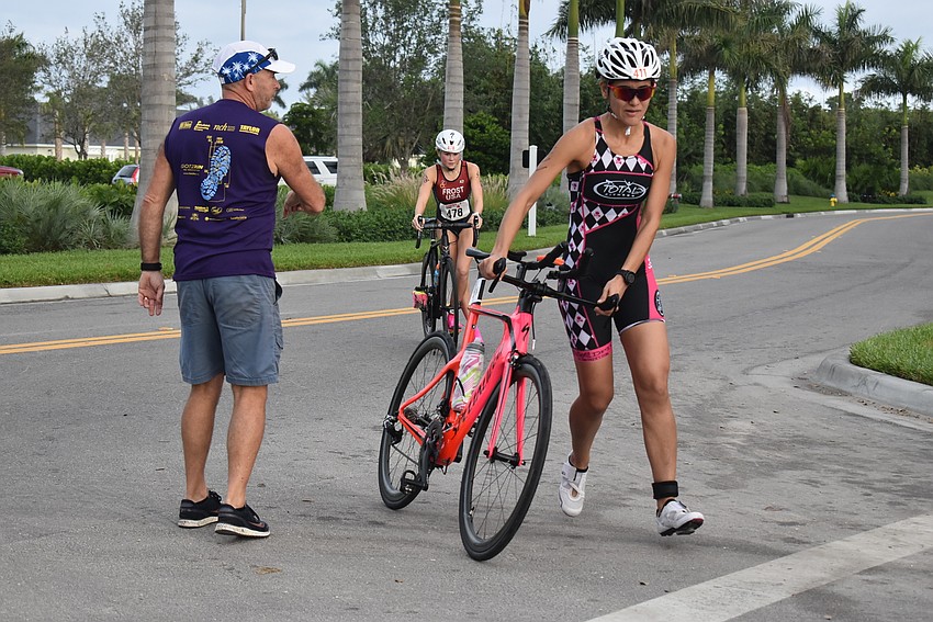 Race organizers direct traffic.