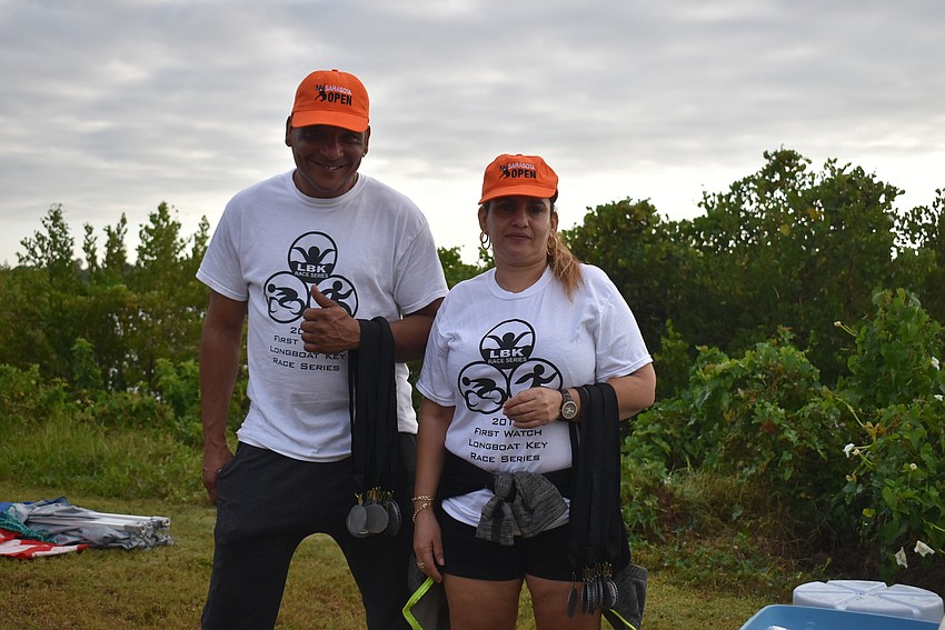 Rafael Jiminez and Solange Perez get ready to hand out medals.