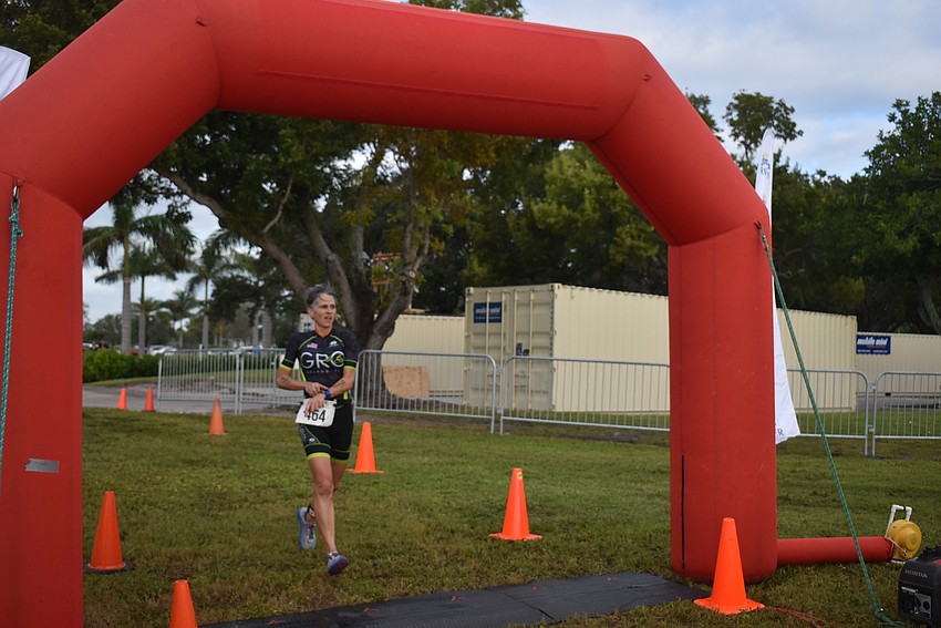 Bego Lopez wins the sprint triathlon.