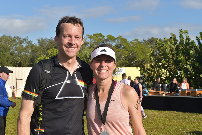 Cord Van Nostrand and Claire Huber after their sprint triathlon finishes.