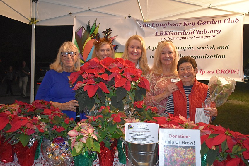 Kip O'Neill, Susan Tone, Susan Phillips, Susan Landau and Phyllis Black of the Garden Club of Longboat Key and their poinsettias.
