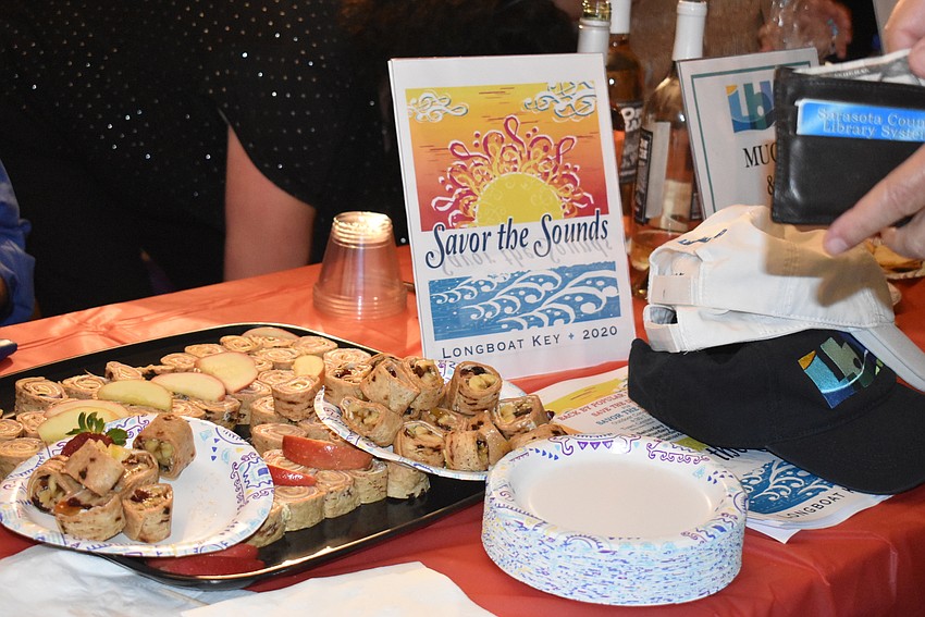 The Longboat Key Chamber of Commerce's table offered snacks and a peek at the next event in the space, Savor the Sounds.