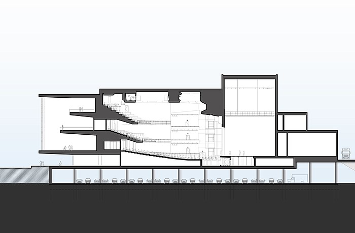 Monday's presentation included this conceptual image showcasing plans to elevate the performing arts center on stilts with parking at ground level.