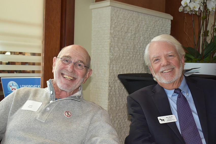 Andy Maass and Ken Marsh sit in the back after everyone has made their way to their seats.