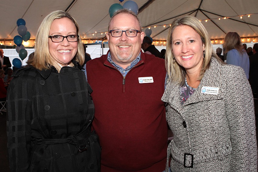 Danielle Hughes, Executive Director Douglas Staley and Heather Gardner
