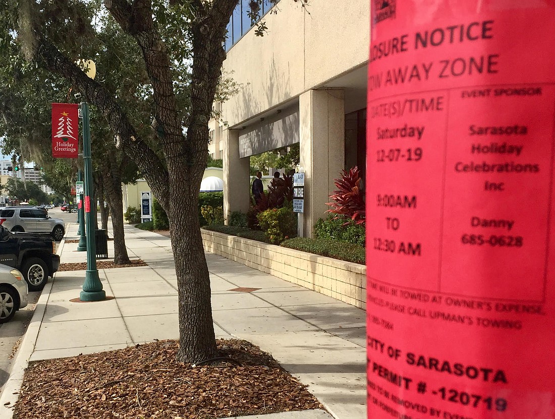 The city has posted leaflets about the Saturday parking restrictions along Main Street.