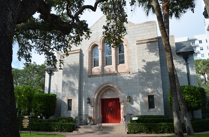Church of the Redeemer officials say they've paid more than $200,000 in permit fees to the city, but they believe they shouldn't have to assume costs associated with sidewalk closures.