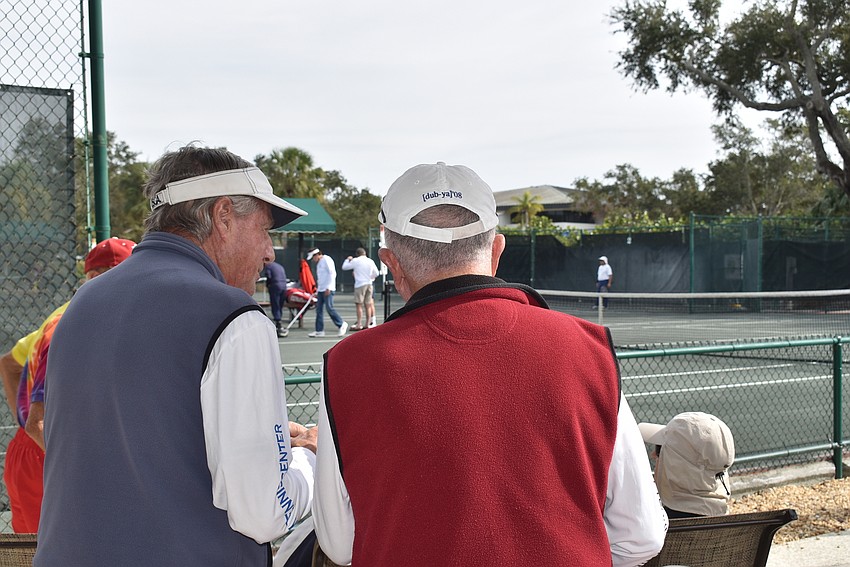 Andy Sawyer and Steve Sills spectate.