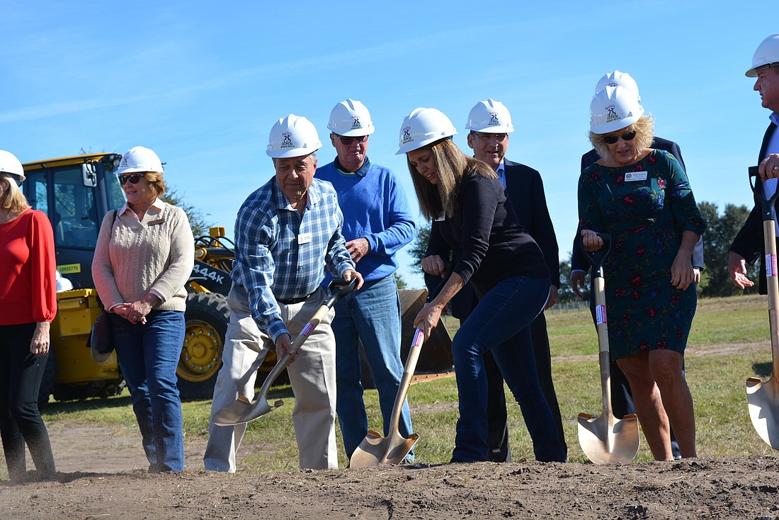 Nate&#39;s Honor Animal Rescue Board President Al Wolfson and Executive Director Dari Oglesby join other officials and board members in a ceremonial groundbreaking ceremony Dec. 6. Construction is expected to last about one year.