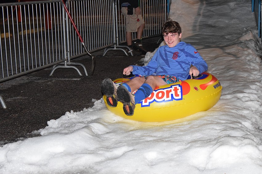 Lakewood Ranch's Kyler Hollingshead sleds down a ramp covered in real snow.