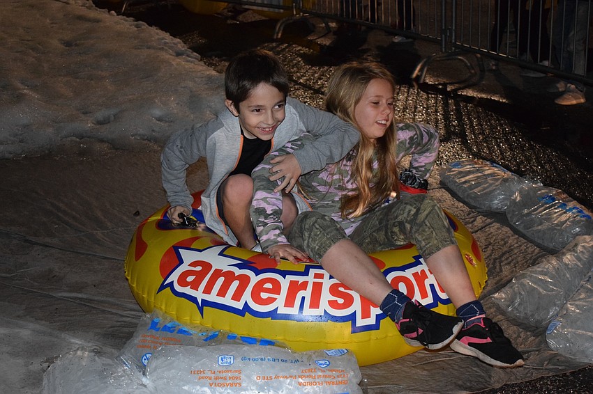 Lakewood Ranch's Nicholas, 8, and Olivia Ricciardi, 10, want to go a second time sledding after having so much fun the first time.