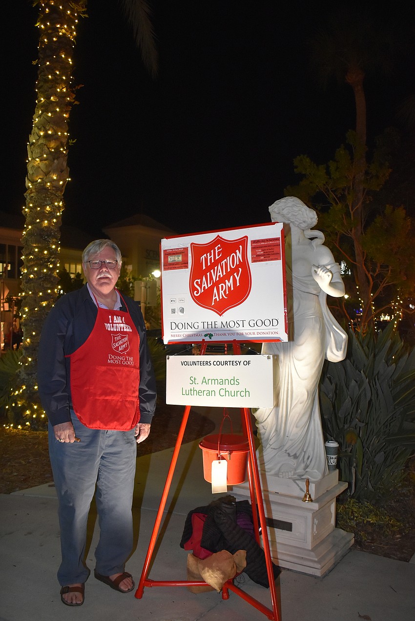 Doug Engebretson rings the bell.