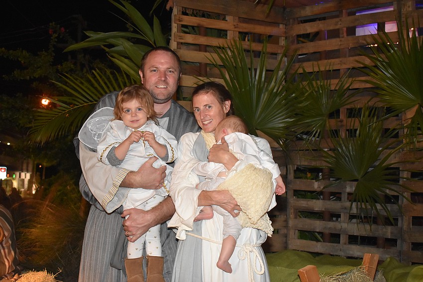 Kris, Laney, Kristen and Owen Bowman and Jesus, Mary and Joseph and an angel.