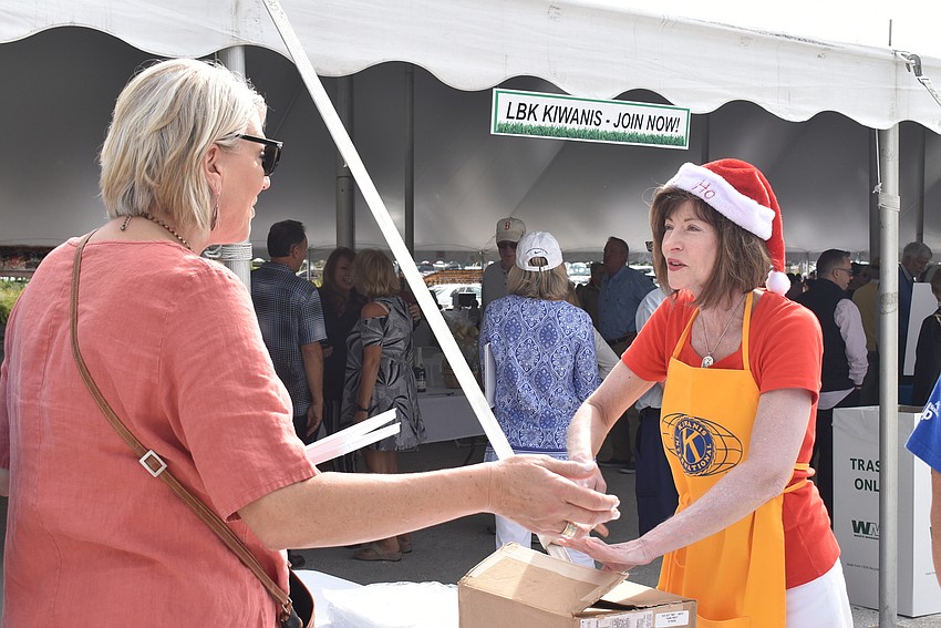 Jill Raleigh gets a ticket from Kathleen Shanley.