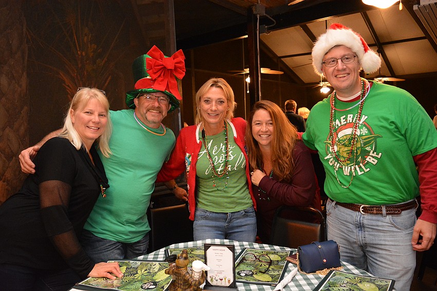 Susanne Hampton enjoyed a boat ride with Dave and Brenda Gradl and Maria Michael Amenta. The Gradl's boat won best decorations last year.