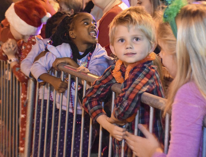 Trenton Bellan, 4, watches as the parade goes by.