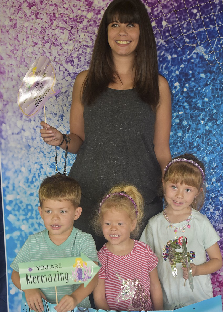 Kimberly Santoro with her kids Sal, 3, Gianna, and Arianna, 3.