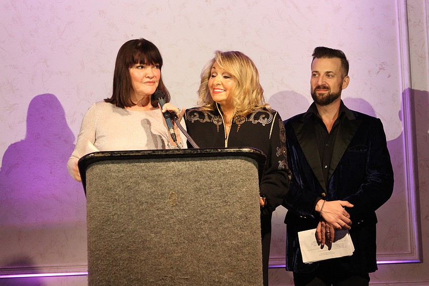 Event chair Martha Harrison, Board President Ida Zito and emcee Joey Panek started the program.