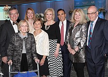 Co-chairs Matt Walsh, Lisa Walsh, Emily Walsh, Marilyn Shuman, Regional President Anne Virag, Regional Director Brian Lipton, and co-chairs Jo and Stan Rutstein