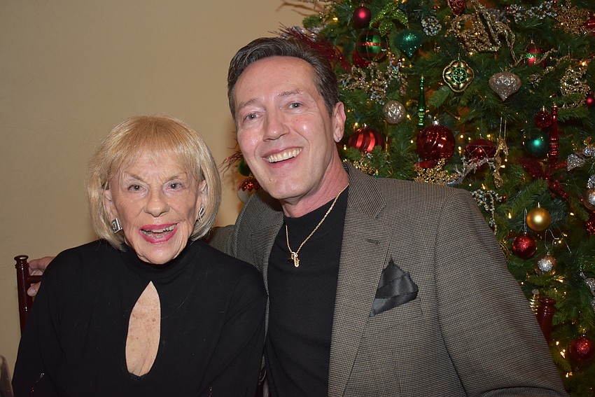 Gloria Moss and Jim Helmich.