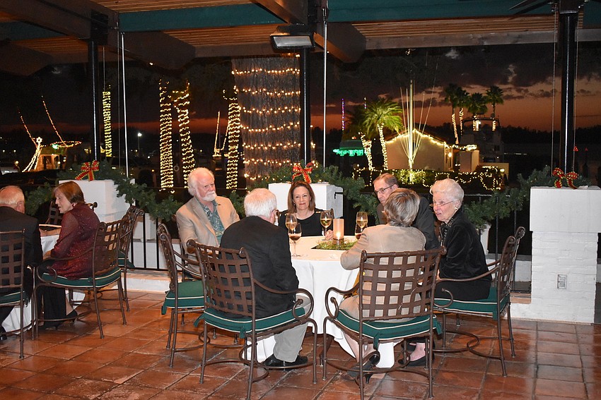 The bay and the patio of the Field House were twinkling with Christmas lights.