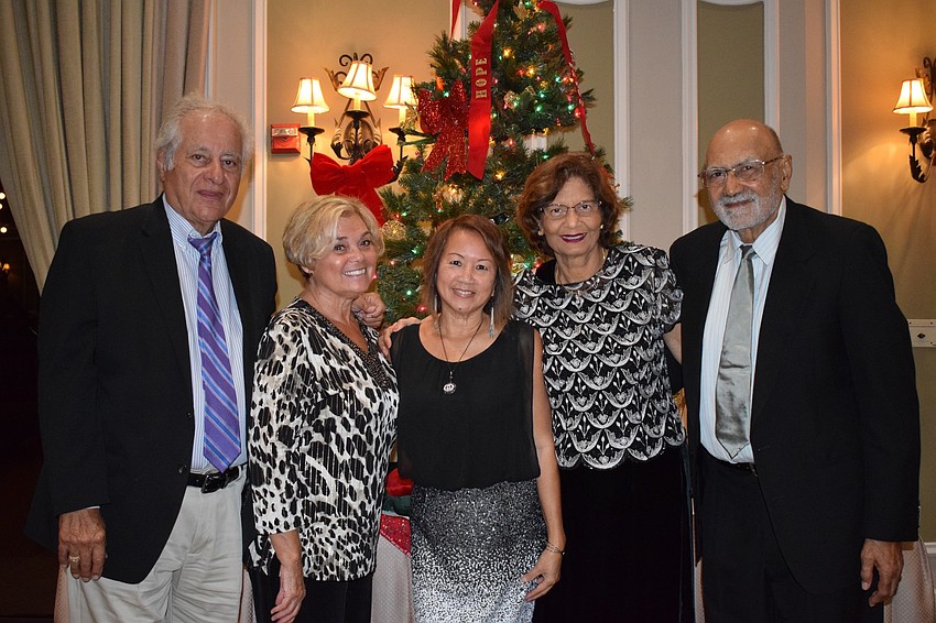 Charles and Patty Difazio visit from Connecticut and attend the charity fundraiser with friends Thuy Patton, Lilly Chaddha and Aroon Chaddha, who are Lakewood Ranch residents.