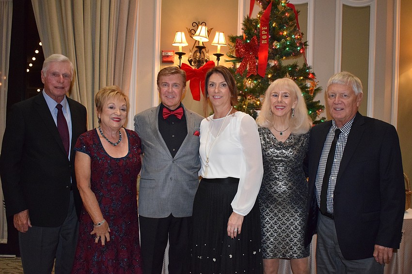 Bob and Patti Wrobel, Joseph and Darlyne Adamchak and Monika and James Templeman enjoy the charity fundraiser. The Wrobels and Adamchaks are gold sponsors of the event.
