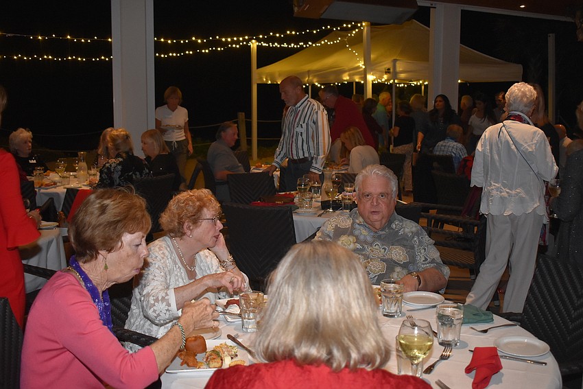 As the night wore on, many settled in their seats to chat with friends.
