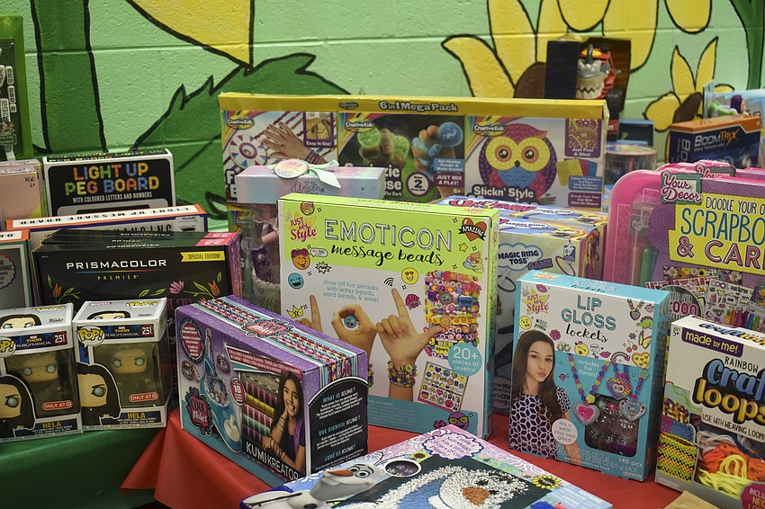 Several tables were lined with gifts for the Boys & Girls Clubs members.