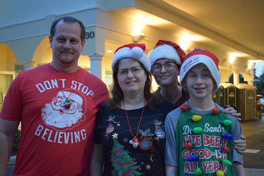 Paul, Kim, Danielle and Jonathan Townsley, of Greenbrook, get into the holiday spirit at the annual Holidays Around the Ranch. Participating in the festivities is a tradition for the Townsley family.