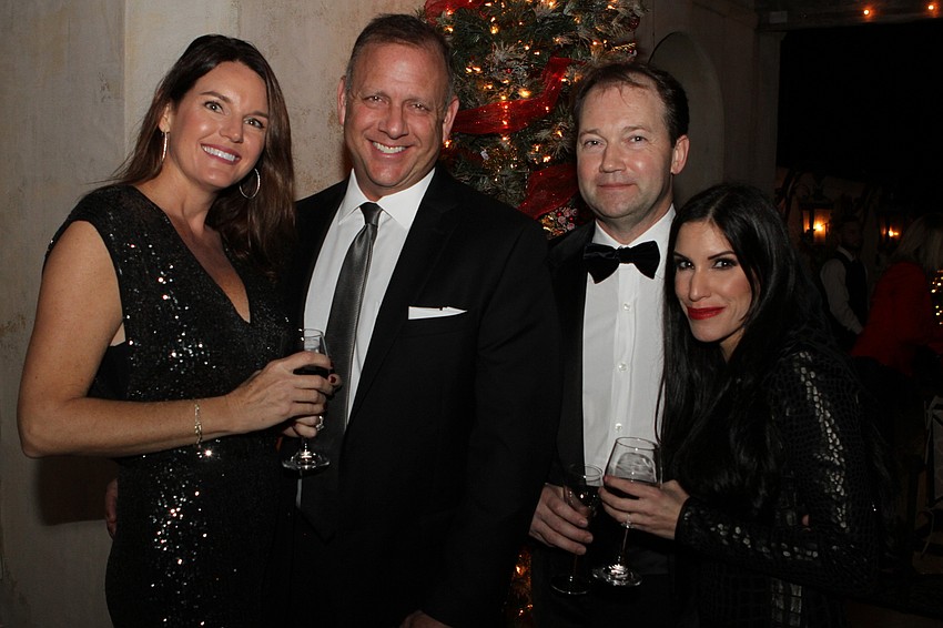 Freedom and Howard Chasolen with Scott and Jessica Middleton