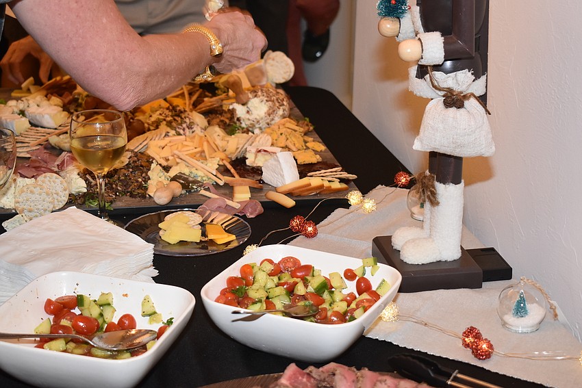 Residents helped themselves to plentiful appetizers.