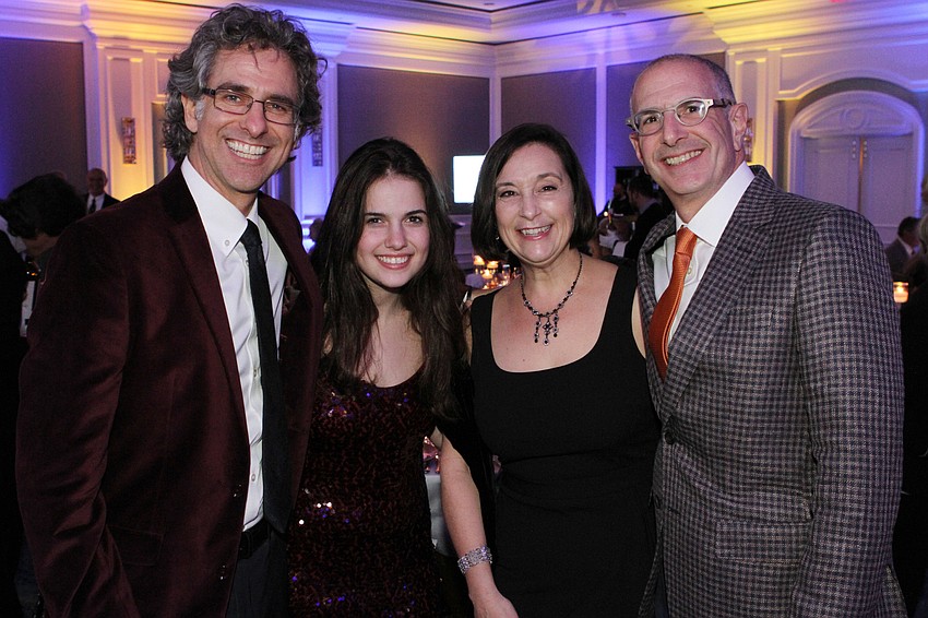 Rabbi Brenner Glickman and Eden Glickman with Kim and Mark Chait