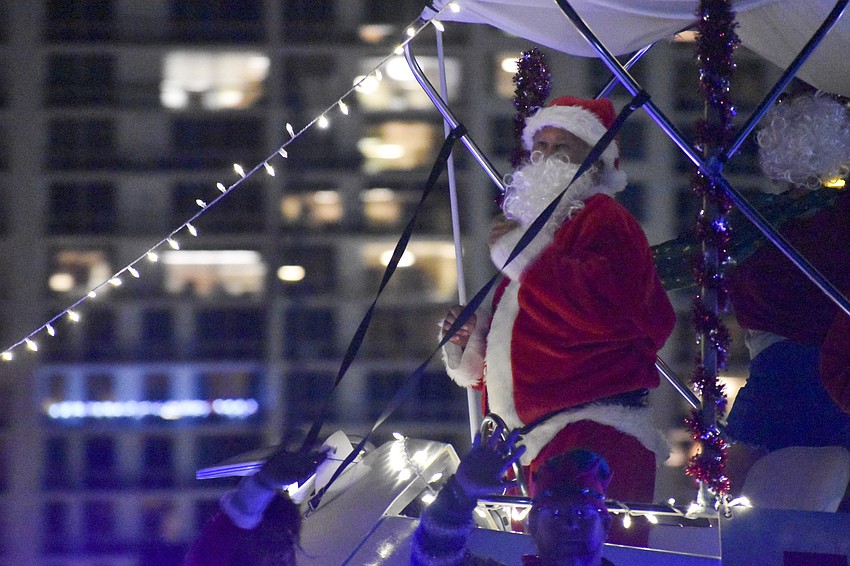Santa Claus made his way through the parade to the tune of 