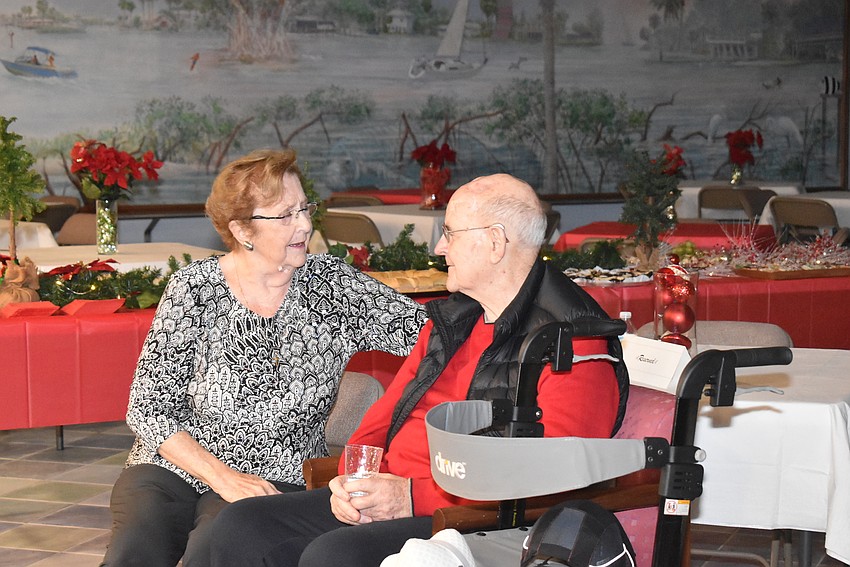 Mary Elizabeth Carey sings with Father Gerry Finegan.