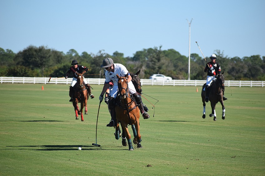 Mark Mulligan of Whiskey Pond/Barefield scores in the first half.