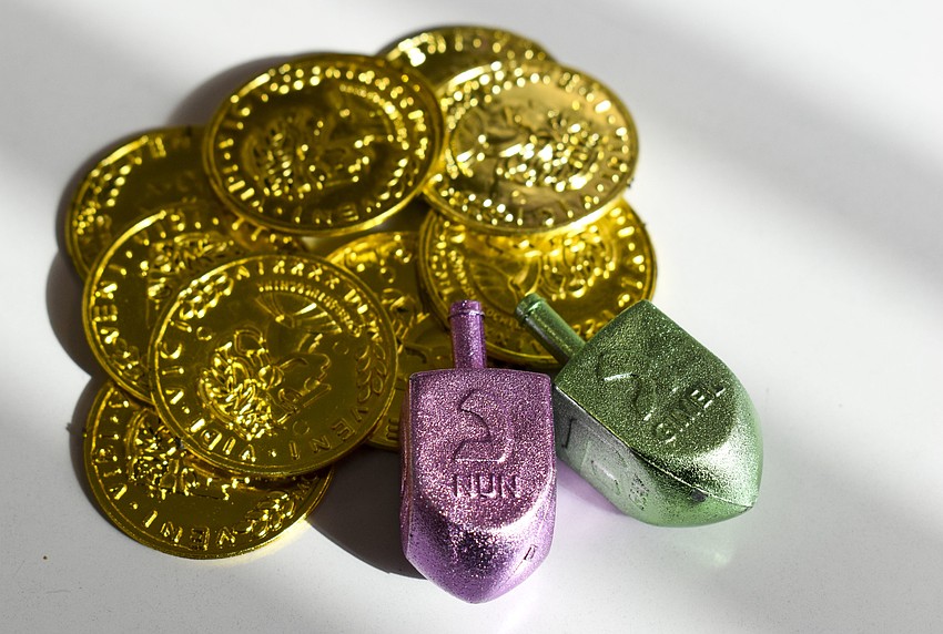 Dreidels and gold cones were some of the items included in the Hanukkits.