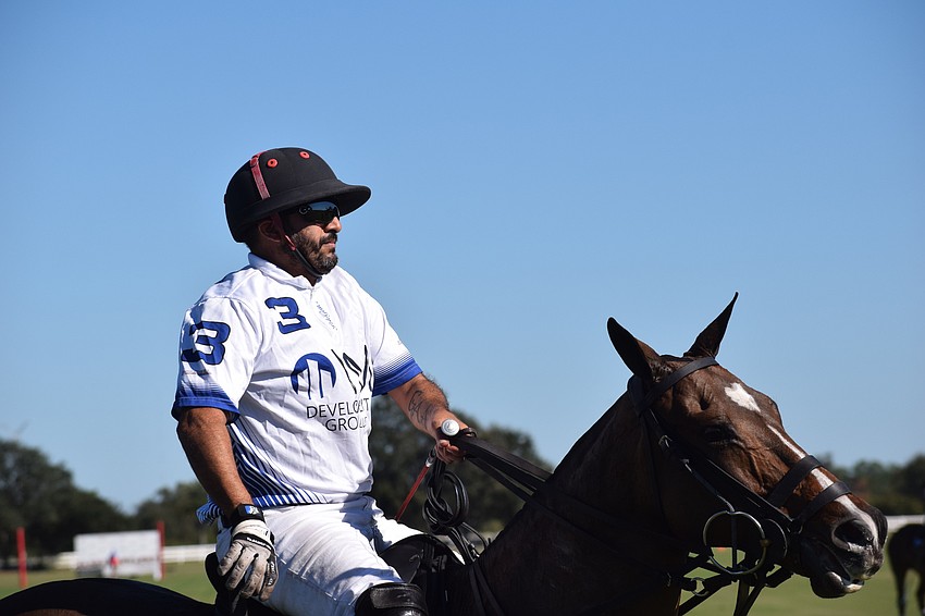 Whiskey Pond/Barefield's Guille Aguero takes a break during the season-opening match