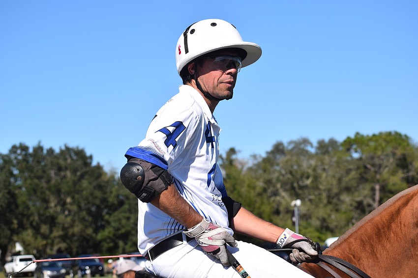 Whiskey Pond/Barefield's Hernan Tasso changes horses after a chukker.