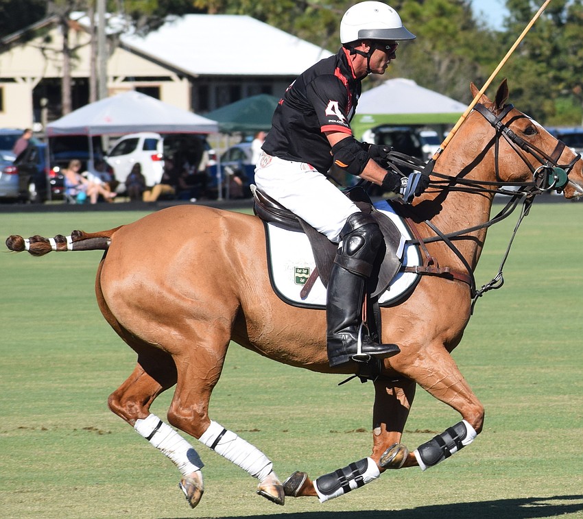 La Estampida/Hillcroft's James Miller is riding on air during the polo club's season opener.