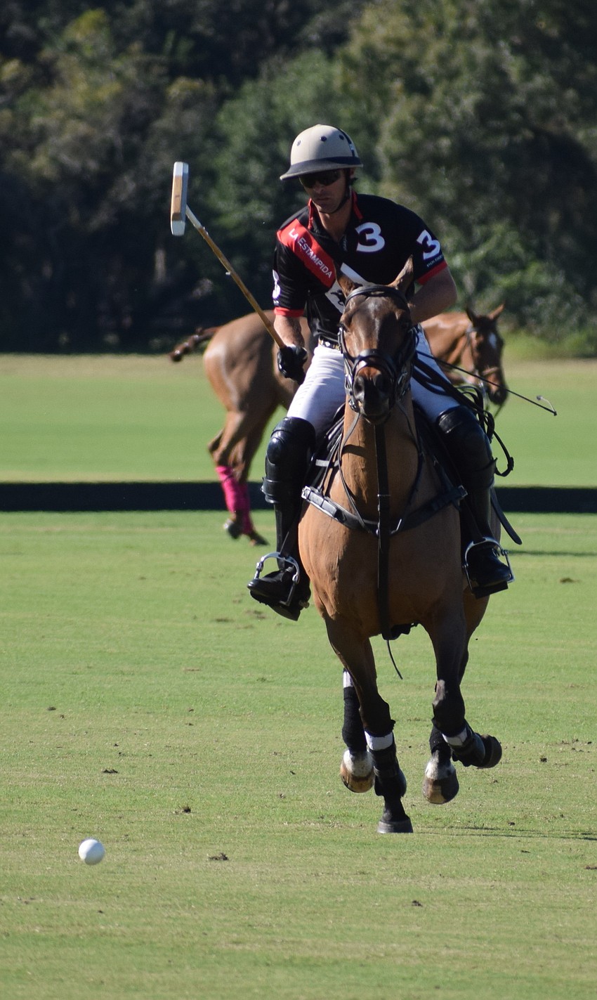 Estampida/Hillcroft's Mason Wroe charges ahead in the second half.