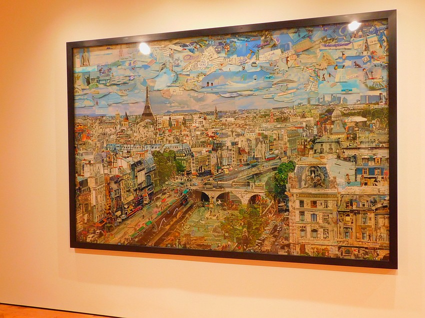 Muniz specializes in creating art from unconventional materials. His large-scale cityscape of Paris is made from bits of postcards — of Paris.