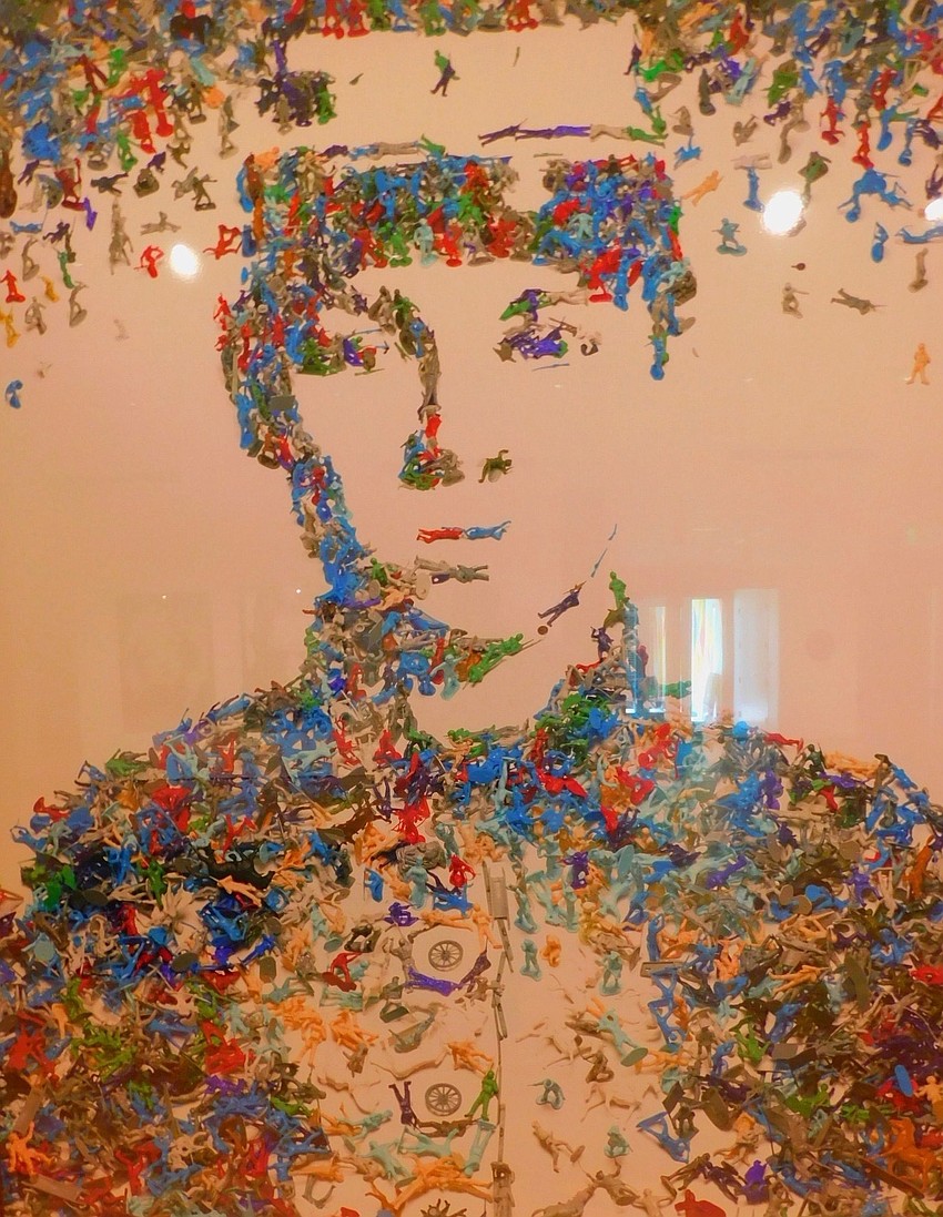 From a distance, this Muniz portrait depicts a ghostly image of a soldier from the distant past ...