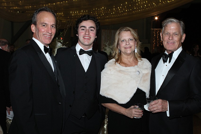 Brent and Liam Hudson with Patti and Scott Tibbetts