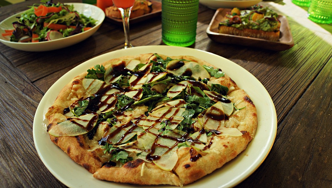 Lemon Tree Kitchen&#39;s vegan pizzas come with a cashew cream in lieu of cheese.